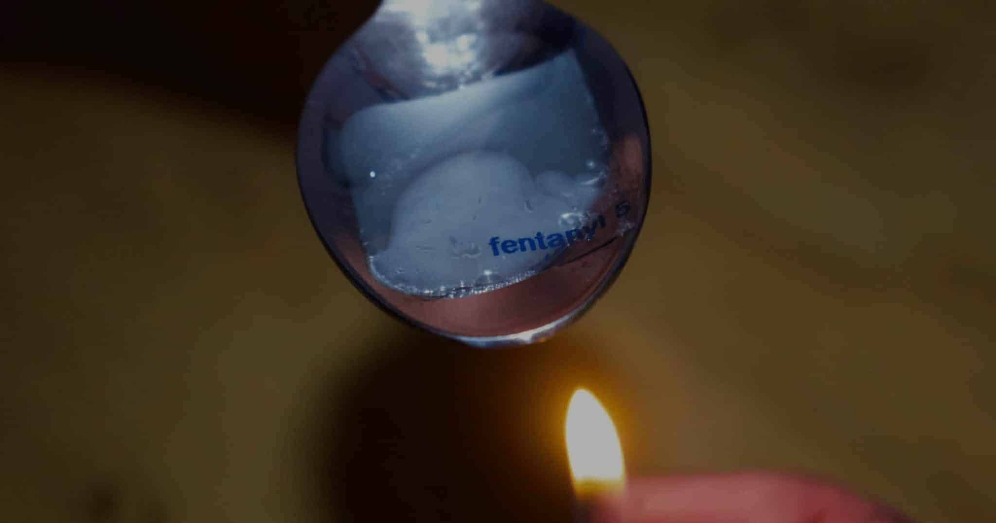 Fentanyl patch being heated on a metal spoon