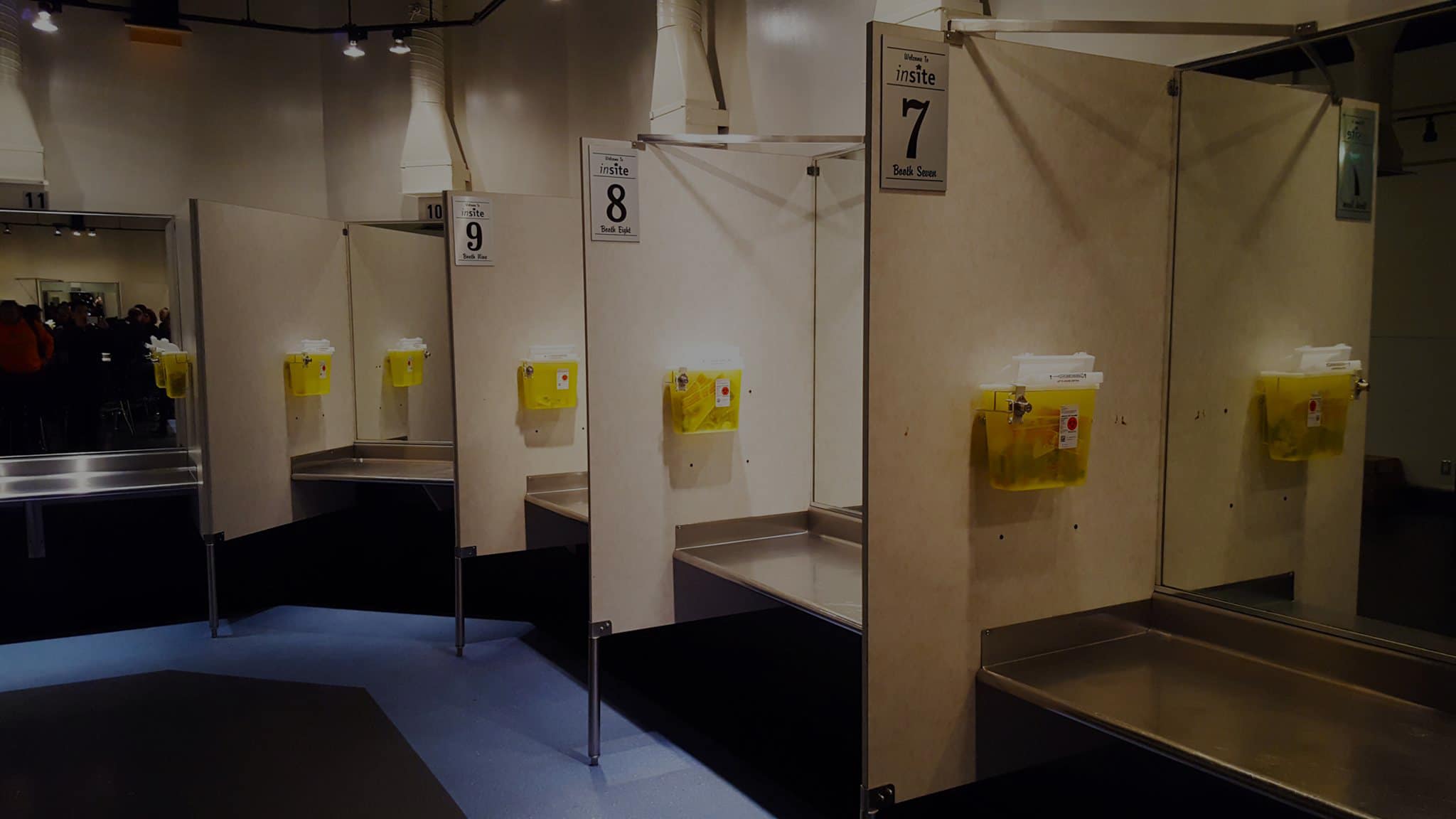 Stalls inside Insite supervised injection site | how harm reduction saved my life