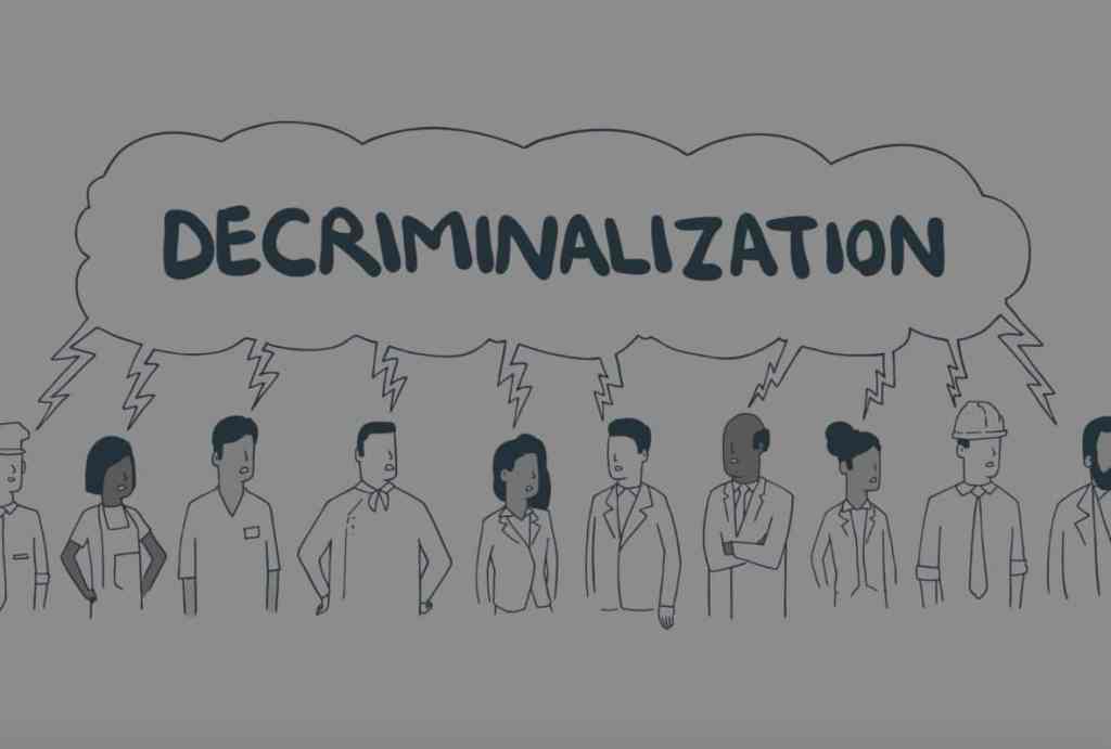 Illustration of people in a row connected to a speech bubble reading "decriminalization"
